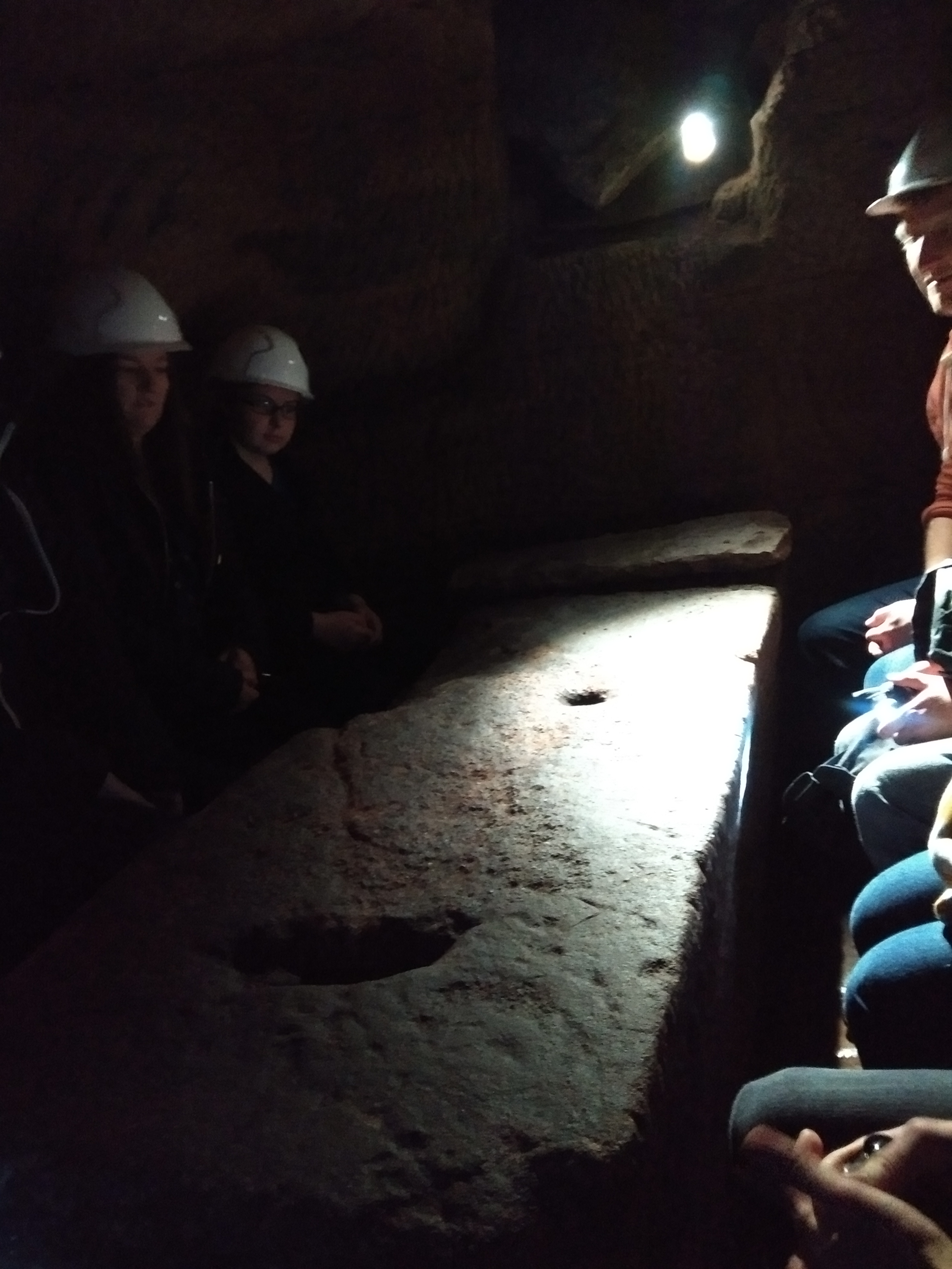 a stone table in an underground cove