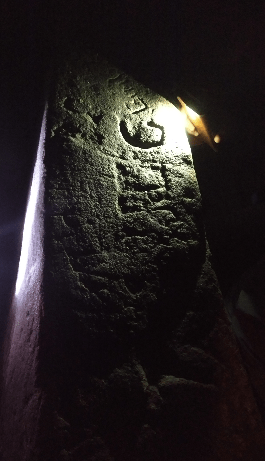 a mason's mark on a table in Gilmerton Cove