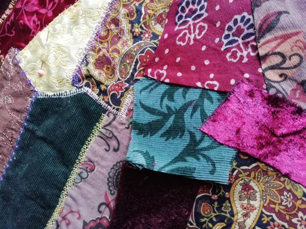 A pile of colourful fabric scraps.